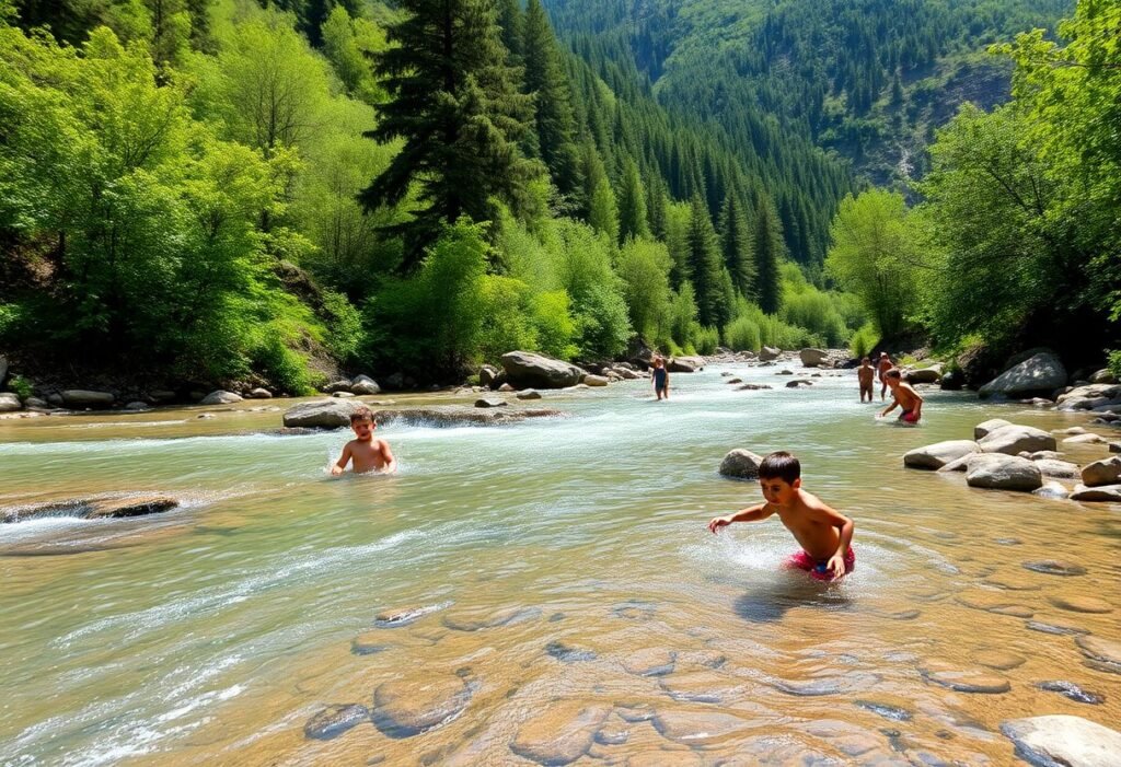 A scenic view of a clear river in the Caucasus mountains of Azerbaijan with children playing.